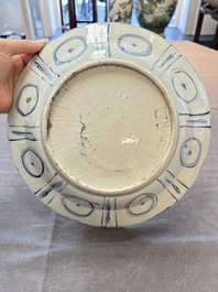 Three Chinese blue and white 'kraak' dishes with a bird and flowers, Wanli