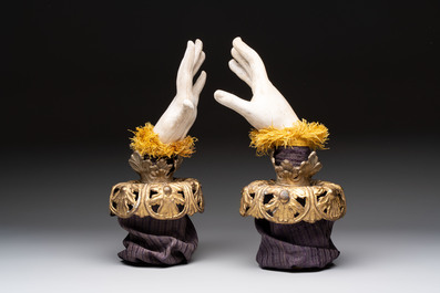 A pair of plaster hands with gilt-bronze cuffs and fabric adornments, Italy, 19th C.