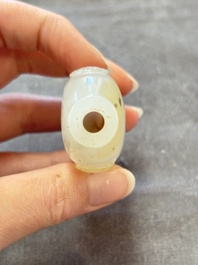 A collection of nine Chinese agate snuff bottles, 20th C.