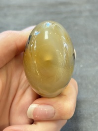 A collection of nine Chinese agate snuff bottles, 20th C.