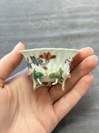 Two Chinese gilt-decorated famille rose cups and saucers with floral design, Qianlong