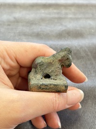 Five Chinese bronze seals and an Indonesian bronze figure group, 18/19th C.
