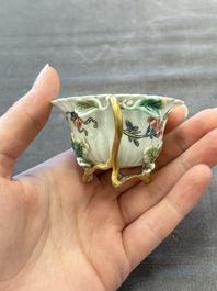 Two Chinese gilt-decorated famille rose cups and saucers with floral design, Qianlong