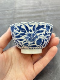 A set of six Chinese blue and white cups and saucers with floral design, Kangxi