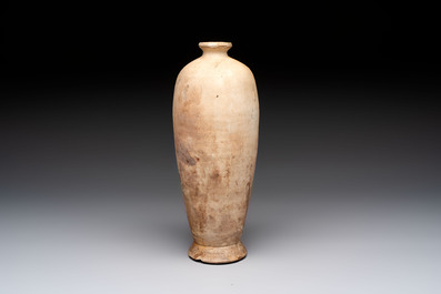A Chinese Cizhou cream-glazed high-shouldered vase, Song/Jin