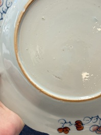 A pair of Chinese famille rose 'tobacco leaf' plates and a saucer, Qianlong