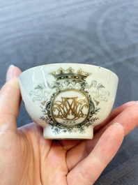Four Chinese grisaille and gilt-decorated monogrammed cups and saucers, Qianlong, dated 1778