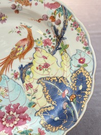 A pair of Chinese famille rose 'tobacco leaf' plates and a saucer, Qianlong