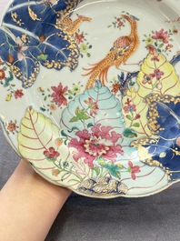 A pair of Chinese famille rose 'tobacco leaf' plates and a saucer, Qianlong