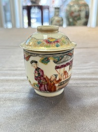 A Chinese Canton famille rose gilt-decorated covered cup and saucer, Qianlong