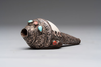 Two Tibetan brass and silver-mounted conch shell trumpets or 'Dung dkar', 19th C.