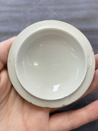 A Chinese Canton famille rose gilt-decorated covered cup and saucer, Qianlong