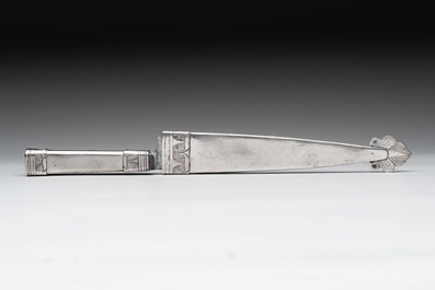 Two Argentinian silver gaucho knives with finely engraved design, 19th C.