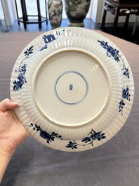 Six Chinese blue and white 'peony scroll' plates, Kangxi