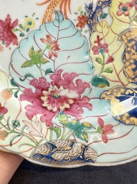 A pair of Chinese famille rose 'tobacco leaf' plates and a saucer, Qianlong