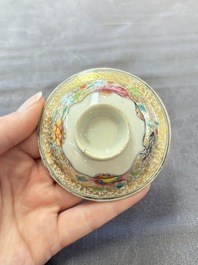 A Chinese Canton famille rose gilt-decorated covered cup and saucer, Qianlong