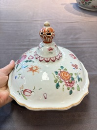 A Chinese famille rose 'mascarons' tureen and cover on stand with floral design, Qianlong