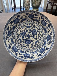 Six Chinese blue and white 'peony scroll' plates, Kangxi