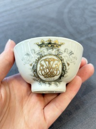 Four Chinese grisaille and gilt-decorated monogrammed cups and saucers, Qianlong, dated 1778