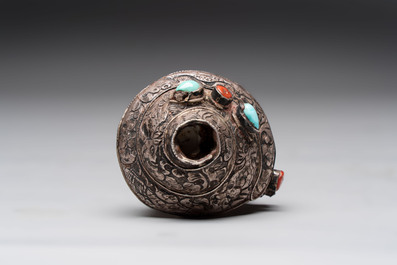 Two Tibetan brass and silver-mounted conch shell trumpets or 'Dung dkar', 19th C.