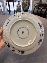 Six Chinese blue and white 'peony scroll' plates, Kangxi