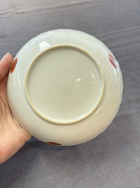 A pair of Chinese famille rose 'tobacco leaf' plates and a saucer, Qianlong
