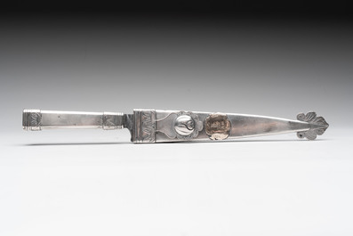 Two Argentinian silver gaucho knives with finely engraved design, 19th C.