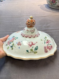 A Chinese famille rose 'mascarons' tureen and cover on stand with floral design, Qianlong