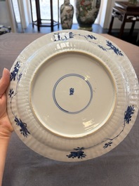 Six Chinese blue and white 'peony scroll' plates, Kangxi