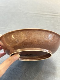 A Chinese copper-red-glazed incised 'dragon' plate, Guangxu mark and possibly of the period