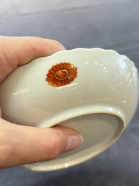 A pair of Chinese famille rose 'tobacco leaf' plates and a saucer, Qianlong