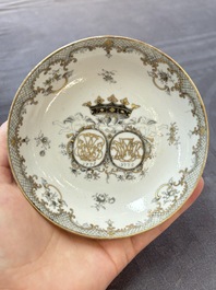 Four Chinese grisaille and gilt-decorated monogrammed cups and saucers, Qianlong, dated 1778
