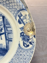 A Chinese blue and white 'Xi Xiang Ji' dish with silver mount, Kangxi mark and of the period