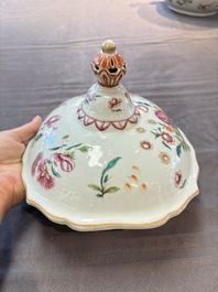 A Chinese famille rose 'mascarons' tureen and cover on stand with floral design, Qianlong