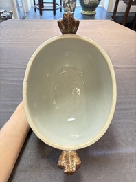 A Chinese famille rose 'mascarons' tureen and cover on stand with floral design, Qianlong