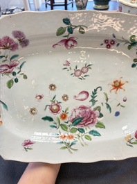 A Chinese famille rose 'mascarons' tureen and cover on stand with floral design, Qianlong