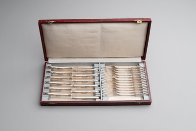 A set of 12 silver dessert forks and dessert knives, 835/000, Wolfers Fr&egrave;res, Brussels, 20th C.