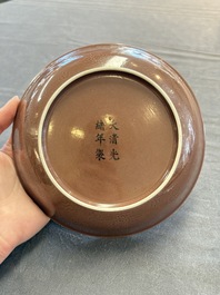 A Chinese copper-red-glazed incised 'dragon' plate, Guangxu mark and possibly of the period