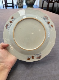 A pair of Chinese famille rose 'tobacco leaf' plates and a saucer, Qianlong