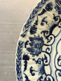Six Chinese blue and white 'peony scroll' plates, Kangxi