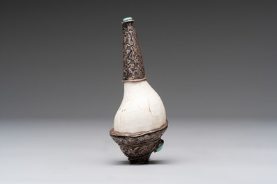 Two Tibetan brass and silver-mounted conch shell trumpets or 'Dung dkar', 19th C.