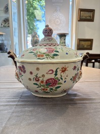 A Chinese famille rose 'mascarons' tureen and cover on stand with floral design, Qianlong