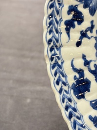 Six Chinese blue and white 'peony scroll' plates, Kangxi
