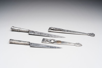 Two Argentinian silver gaucho knives with finely engraved design, 19th C.