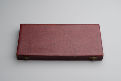 A set of 12 silver dessert forks and dessert knives, 835/000, Wolfers Fr&egrave;res, Brussels, 20th C.