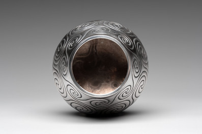 A silver amphora on stand and a Lalaounis silver vase, 925/000, Greece, 20th C.