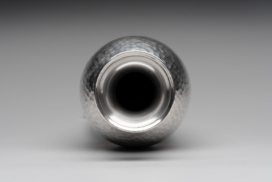 A silver amphora on stand and a Lalaounis silver vase, 925/000, Greece, 20th C.