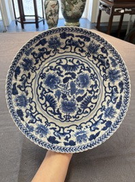 Six Chinese blue and white 'peony scroll' plates, Kangxi