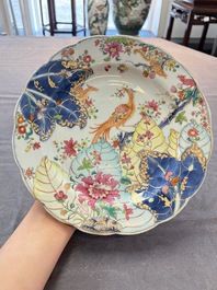 A pair of Chinese famille rose 'tobacco leaf' plates and a saucer, Qianlong