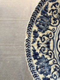 Six Chinese blue and white 'peony scroll' plates, Kangxi